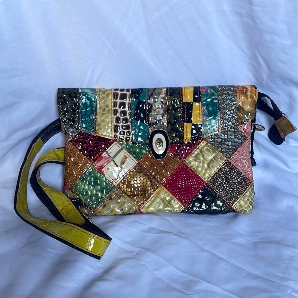 Faux snakeskin bag from Spain! Adjustable strap. Never been used!